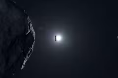 Artist's impression of ESA's Hera gliding past the asteroid Didymos towards its moonlet Dimorphos.
